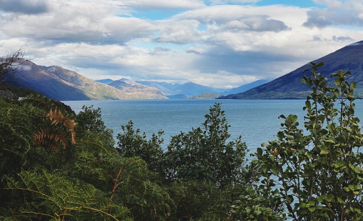A view of Lake Hayes and the surrounding mountains from Crown Range Road, New Zealand.