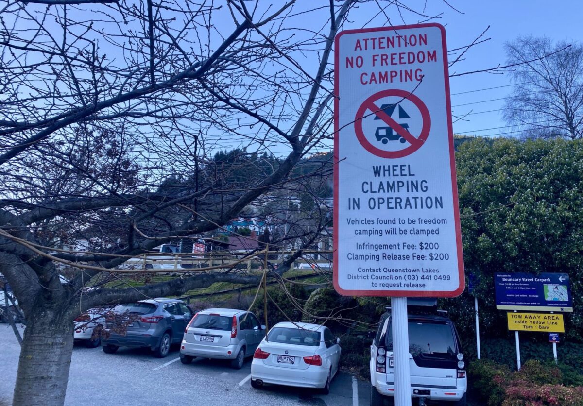 A "No freedom camping" sign in Queenstown, New Zealand.