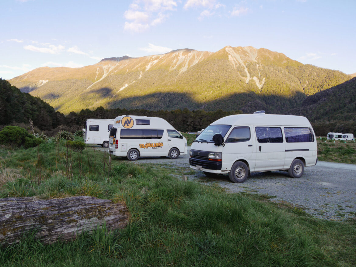 A few converted vans at a campground near Milford Sound, New Zealand.