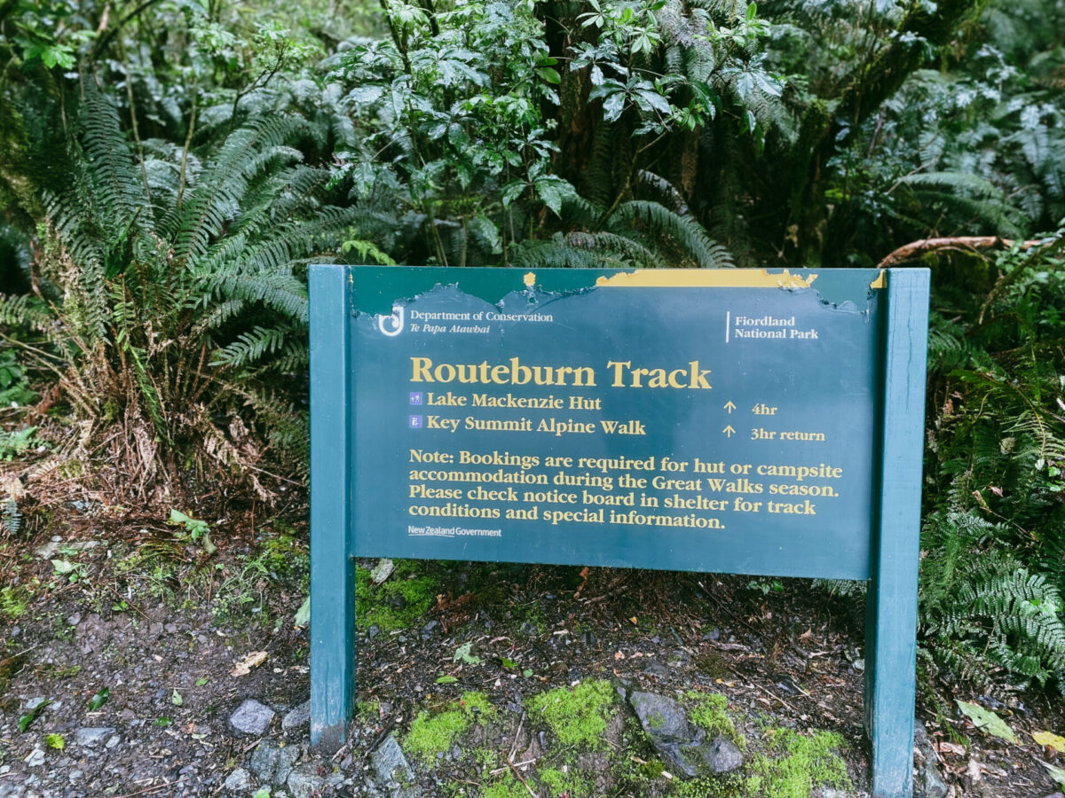 A sign for the start of the Routeburn Track in Fiordland National Park, NZ