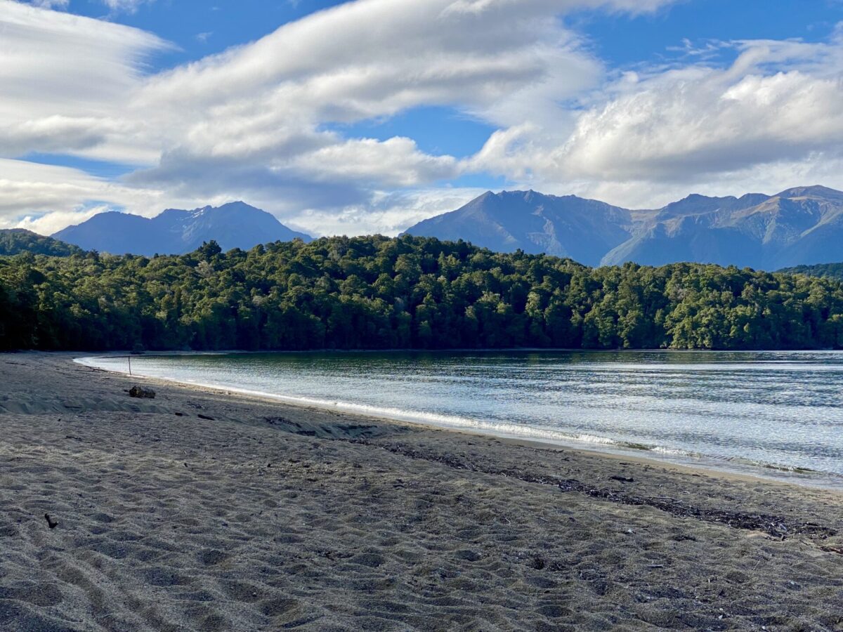 Lake Te Anau and a moutain background seen from the Broad Bay campsite in Fiordland National Park.