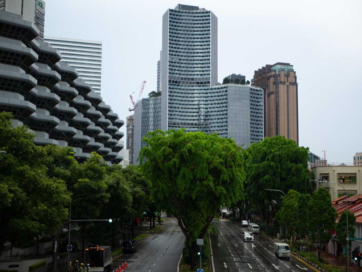 A photo of some skyscrapers on a rainy day in Singapore.