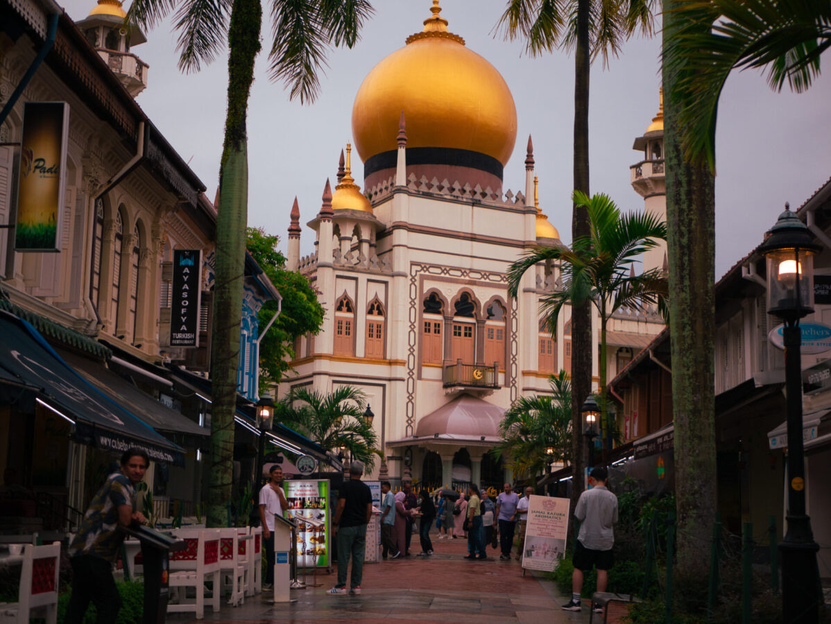 The golden-domed Masjid Sultan Mosque towering over the Kampong Glam neighborhood in Singapore.