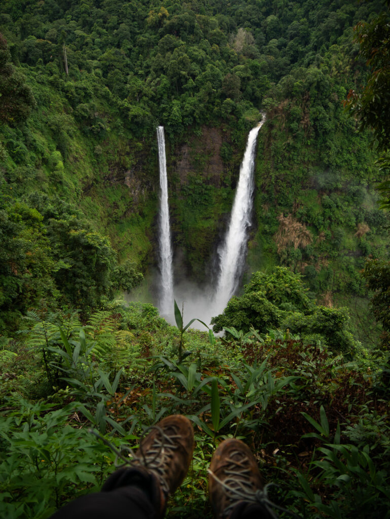 The impressive Tad Fane twin waterfalls on the Bolaven Plateau Loop in Laos.