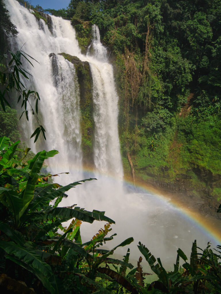 The Tad Yuan falls with a rainbow along the Bolaven Plateau Loop in southern Laos.